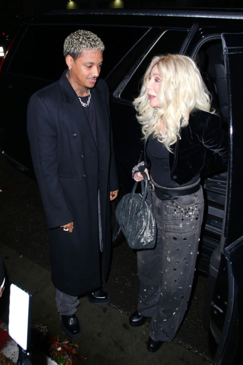 Cher and Alexander Edwards Arriving at Warner Bros Music Pre-Grammy Party, February 2024 6