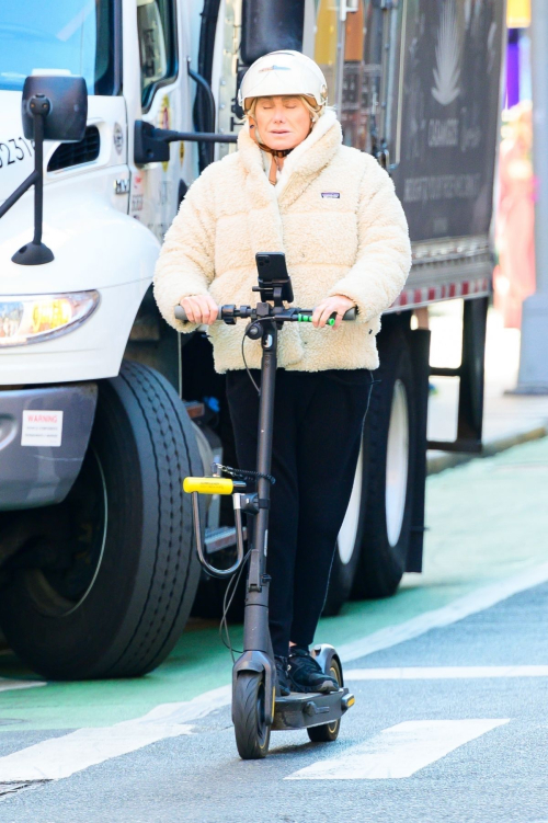 Deborra-Lee Fuentes Riding an Electric Scooter Out in New York, March 2024