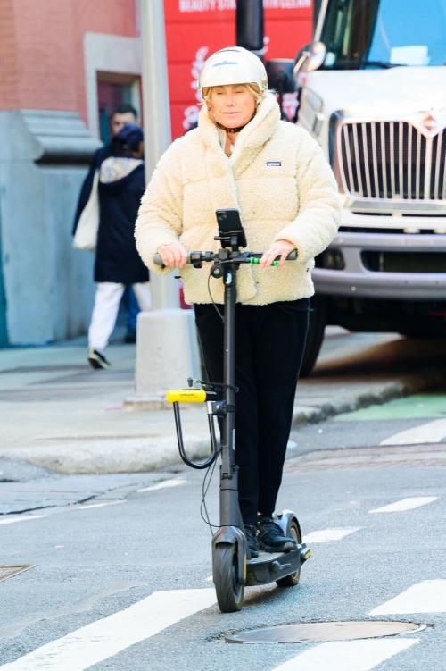 Deborra-Lee Fuentes Riding an Electric Scooter Out in New York, March 2024 2