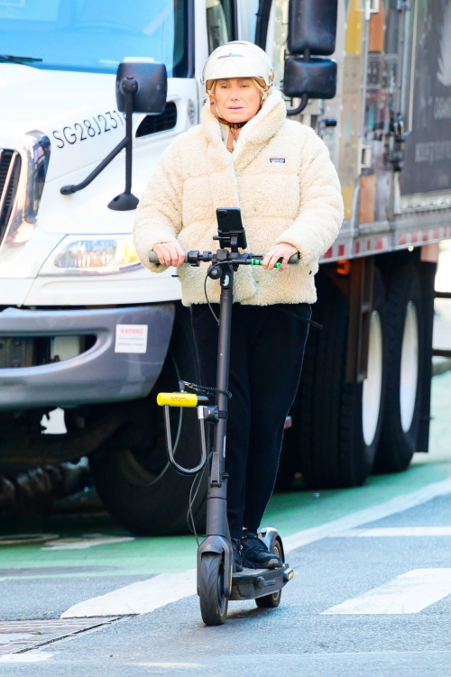 Deborra-Lee Fuentes Riding an Electric Scooter Out in New York, March 2024 4