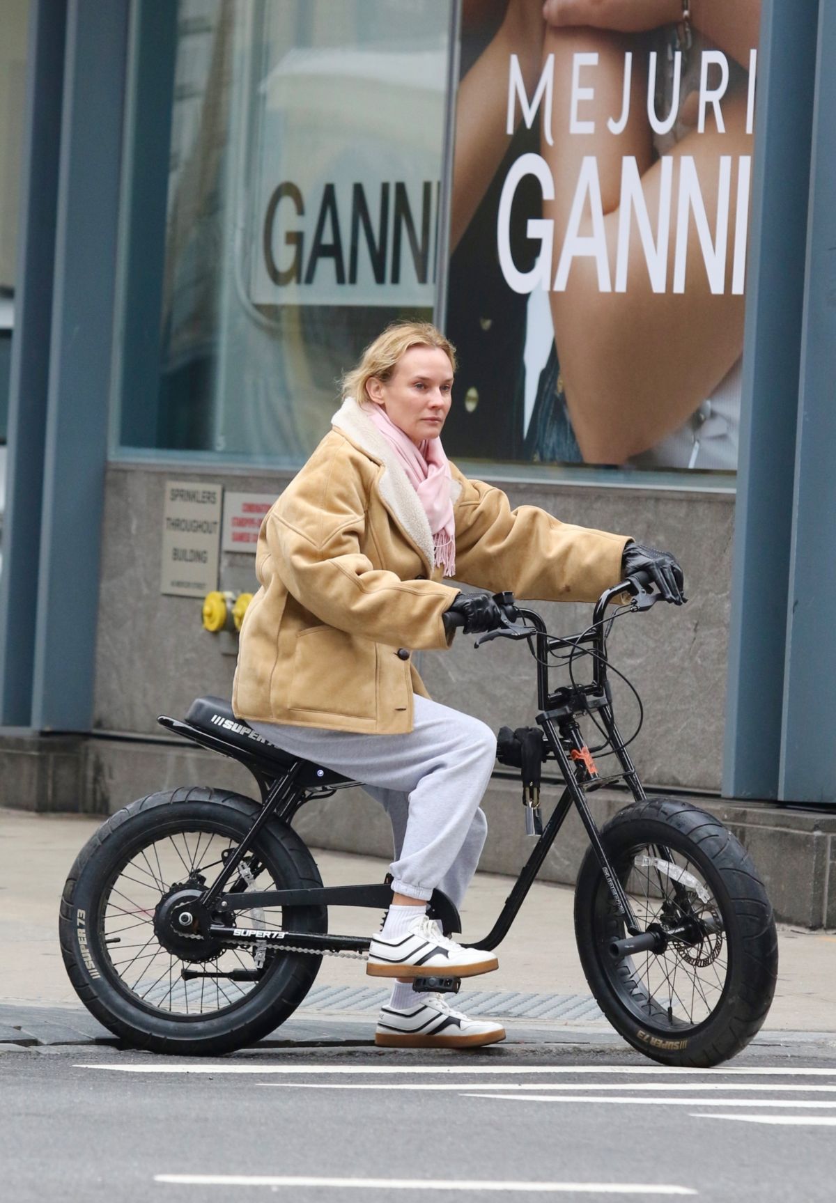 Diane Kruger Rides Ger Electric Bike in New York, March 2024