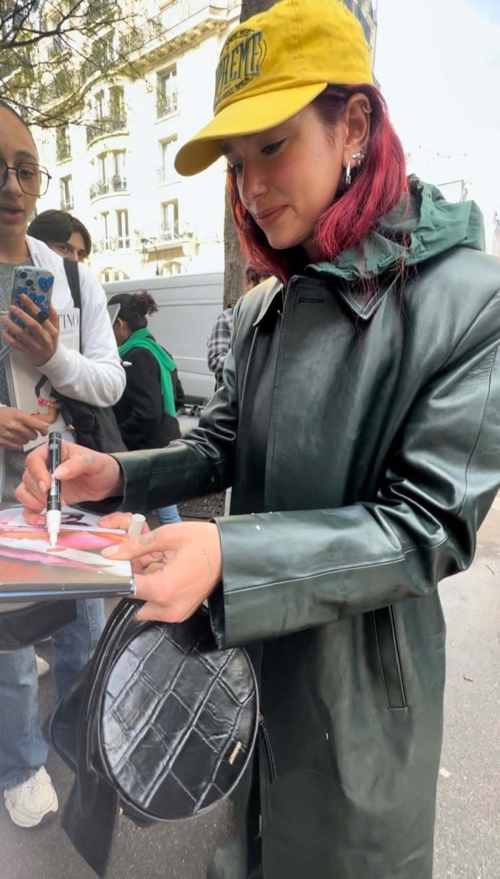 Dua Lipa Signed Autographs for Fans Out in Paris, March 2024 3