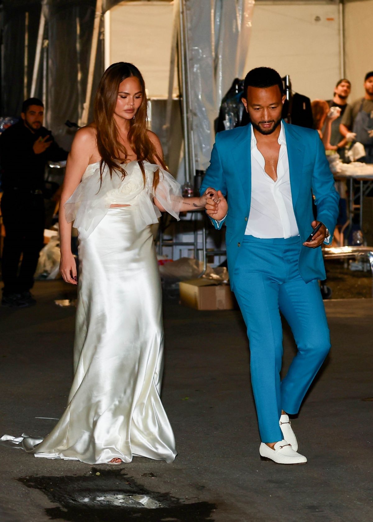 Chrissy Teigen and John Legend Attend Charity Event Hosted by Prada