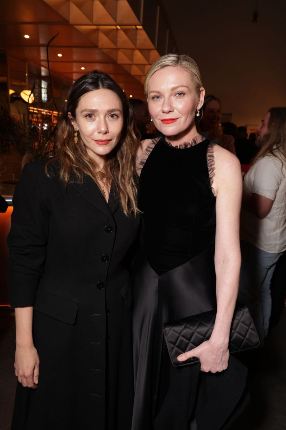 Elizabeth Olsen and Kirsten Dunst at Civil War Special Screening in Los Angeles