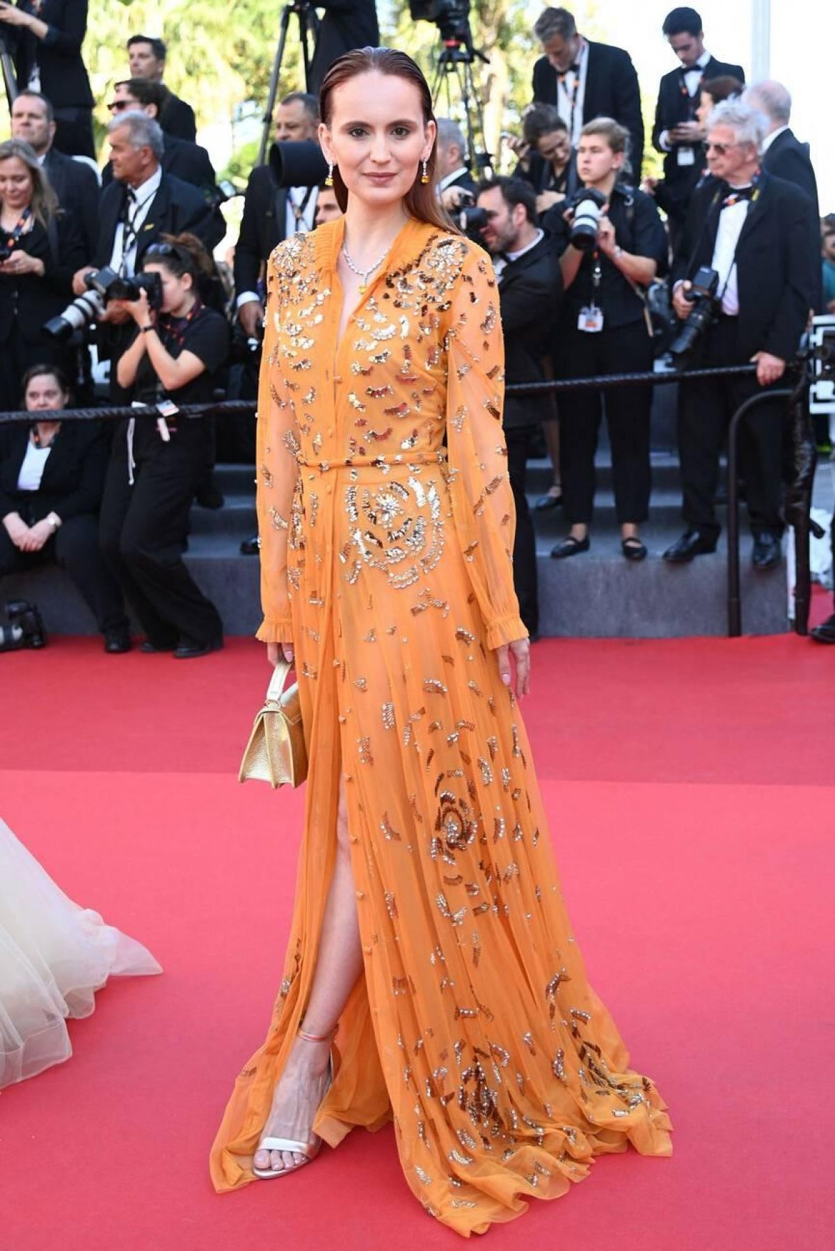 Agatha Maksimova at Kinds of Kindness Premiere at 77th Cannes Film Festival