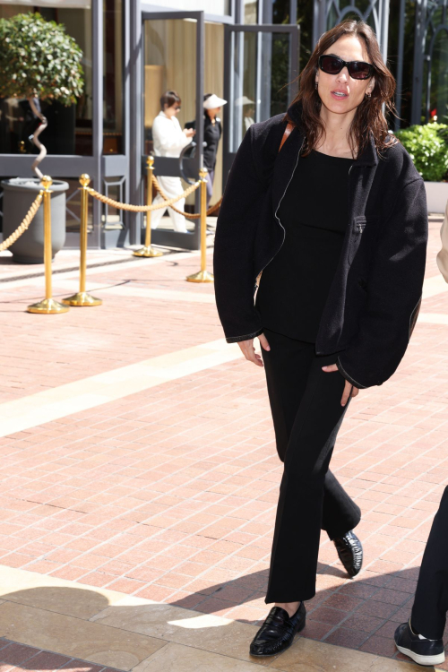 Alexa Chung Arrives at Hotel Majestic at 77th Cannes Film Festival 2