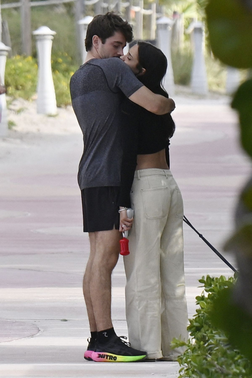 Alexandra Saint Mleux and Charles Leclerc Walk with Dog on Beach in Miami