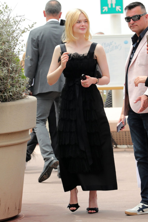 Elle Fanning Leaves Hotel Martinez in Cannes 1