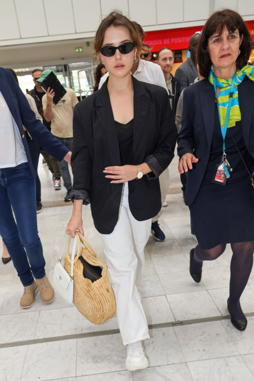 Katherine Langford Leaves 77th Cannes Film Festival at Nice Airport 4