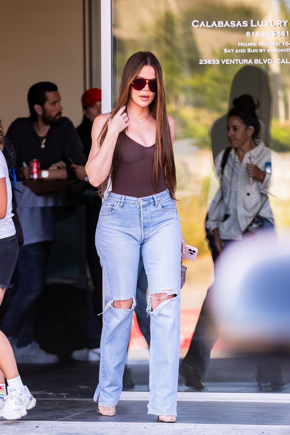 Khloe Kardashian Filming with Scott Disick at His Calabasas Luxury Motors Dealership in Calabasas