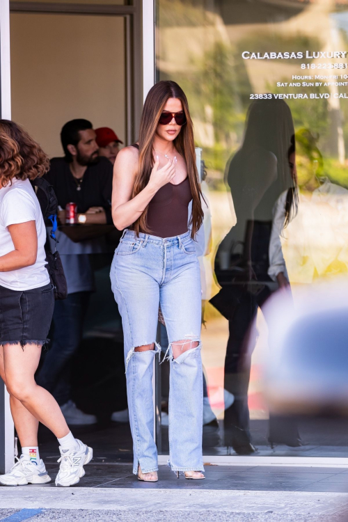 Khloe Kardashian Filming with Scott Disick at His Calabasas Luxury Motors Dealership in Calabasas 1