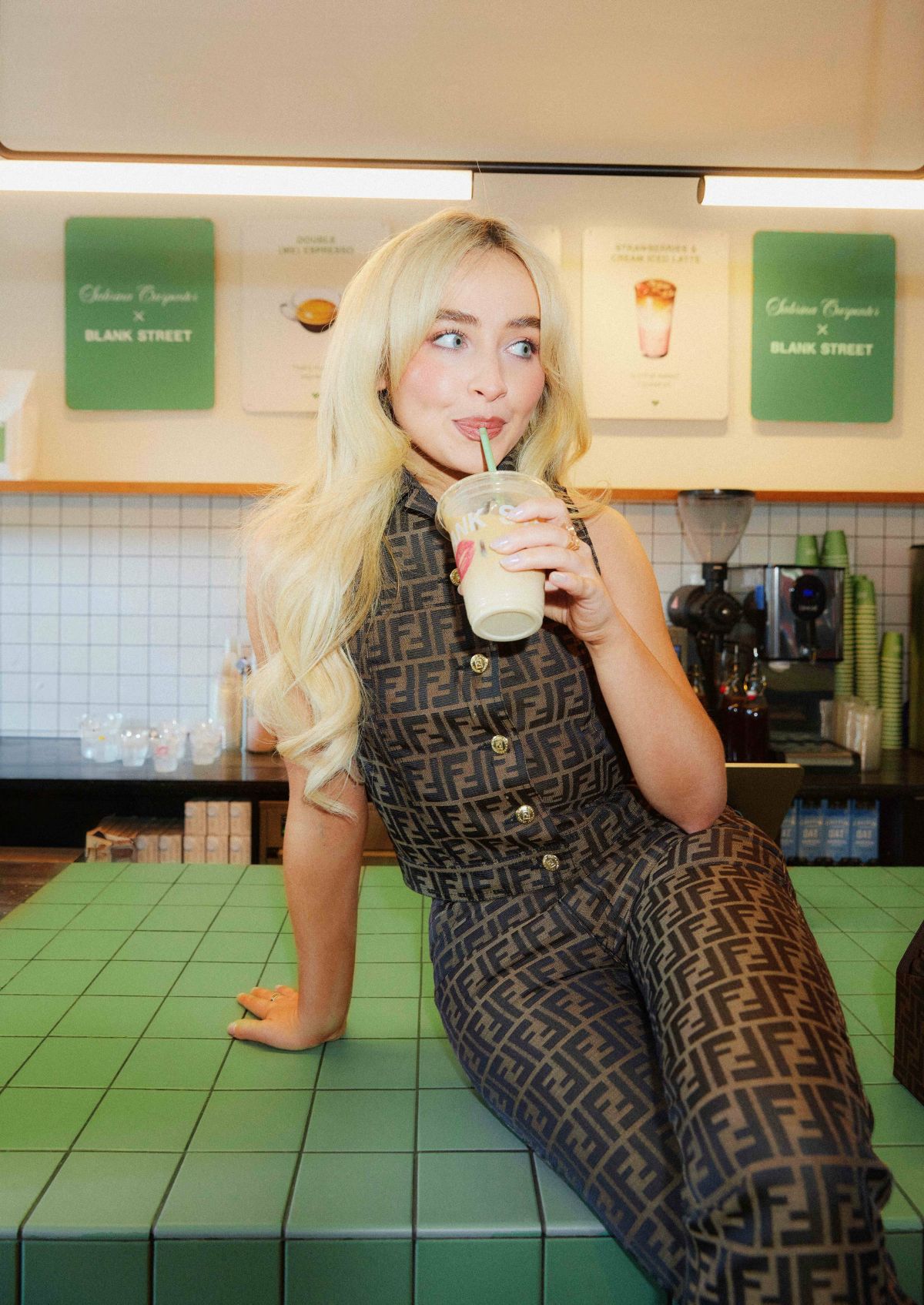 Sabrina Carpenter at a Surprise Photoshoot at Blank Street Coffee in London