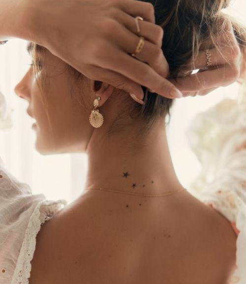 Alessandra Ambrosio shows off her Stars Tattoo her Neck Photos, July 2024 2