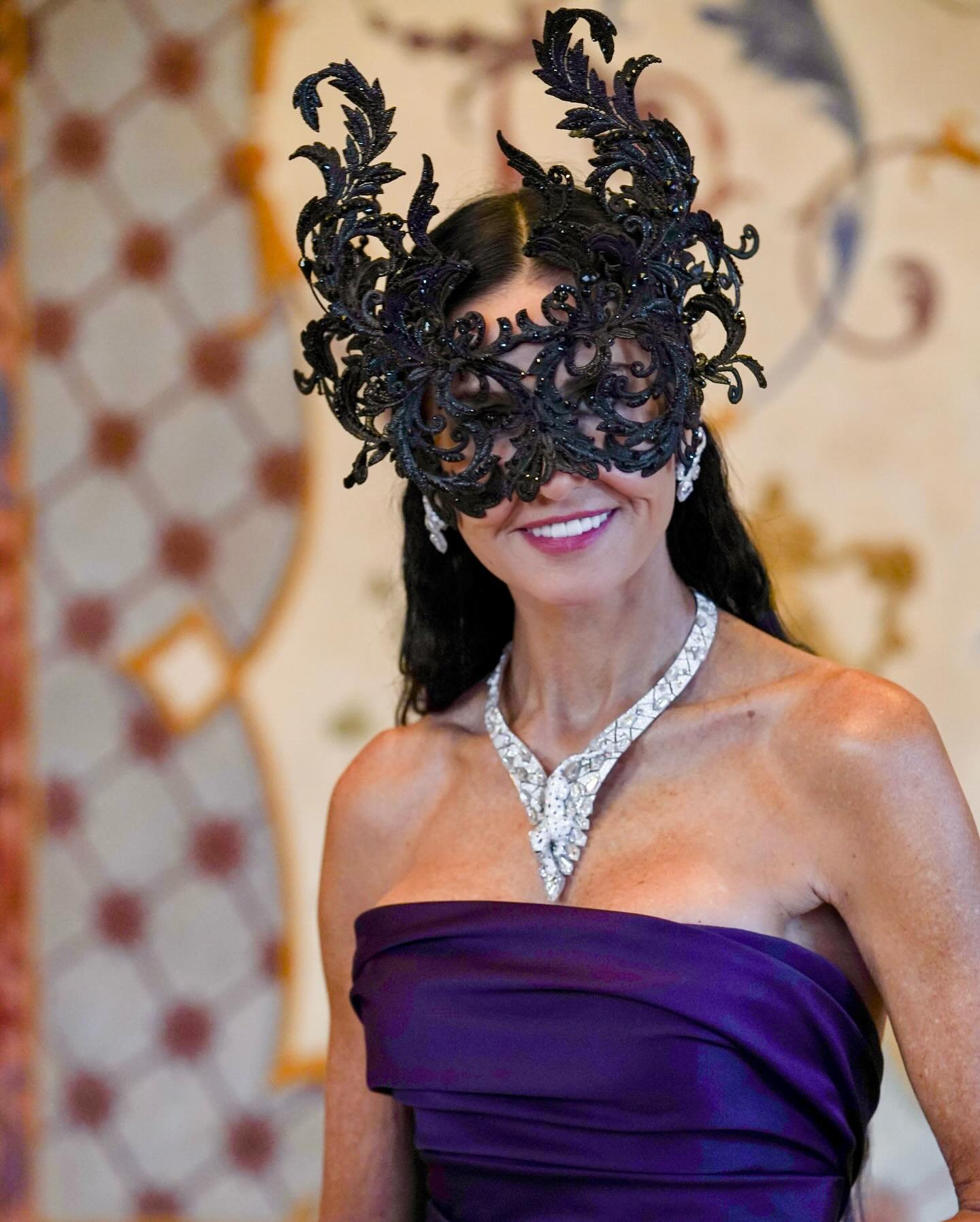 Demi Moore wears Mask and Purple Gown Dress at Cartier Jewelry Gala Event, June 2024