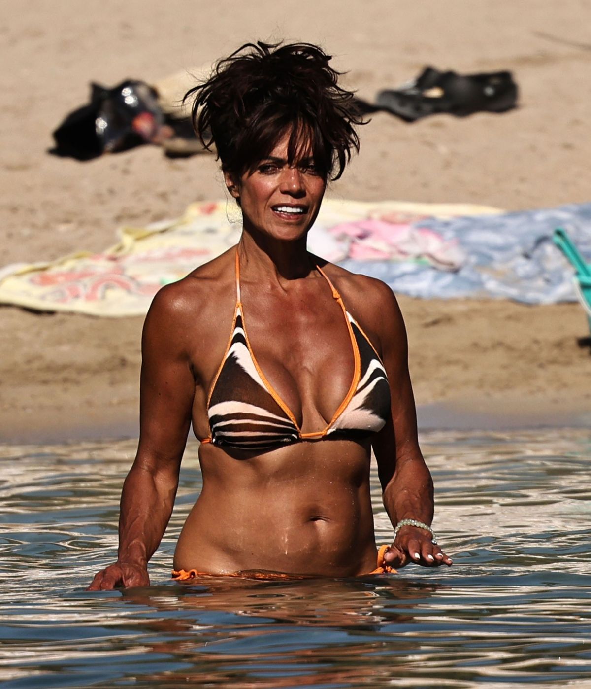 Jenny Powell in Bikini at a Beach in Ibiza, July 2024