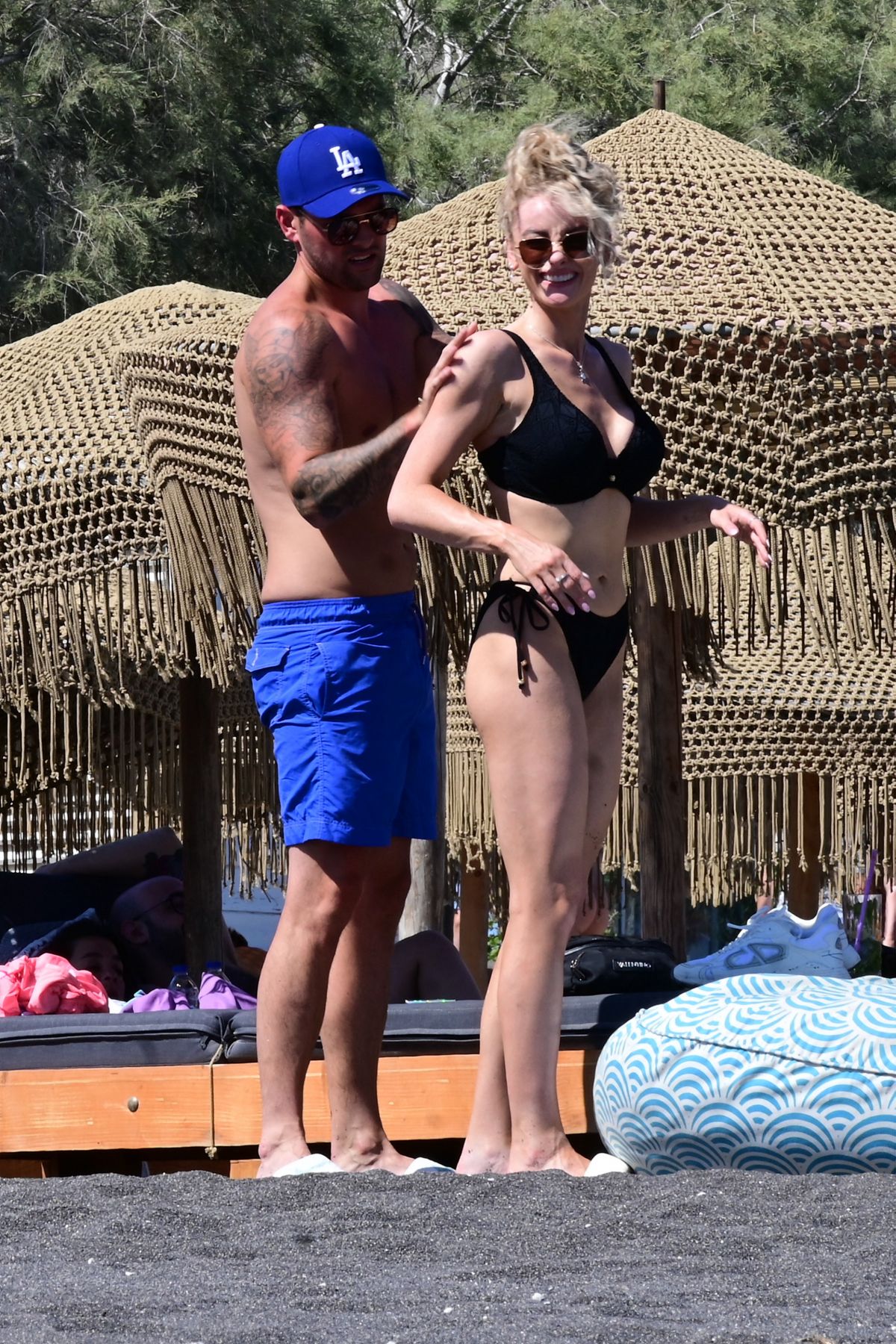 Katie McGlynn in Black Bikini at a Beach in Santorini, July 2024