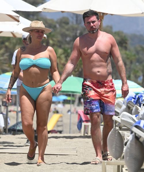 Kerry Katona in Turquoise Color Bikini and Ryan Mahoney at a Beach in Marbella, July 2024 3