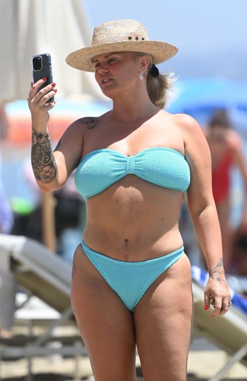 Kerry Katona in Turquoise Color Bikini and Ryan Mahoney at a Beach in Marbella, July 2024 1