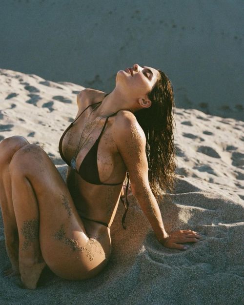 Kylie Jenner seen in Black Bikini Pose in Sand Photoshoot, July 2024 1