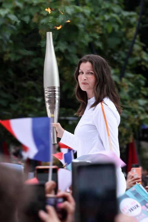 Laetitia Casta at 2024 Paris Olympic Games Torch Relayat Saint-Denis 2