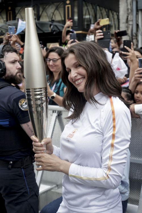 Laetitia Casta at 2024 Paris Olympic Games Torch Relayat Saint-Denis 1