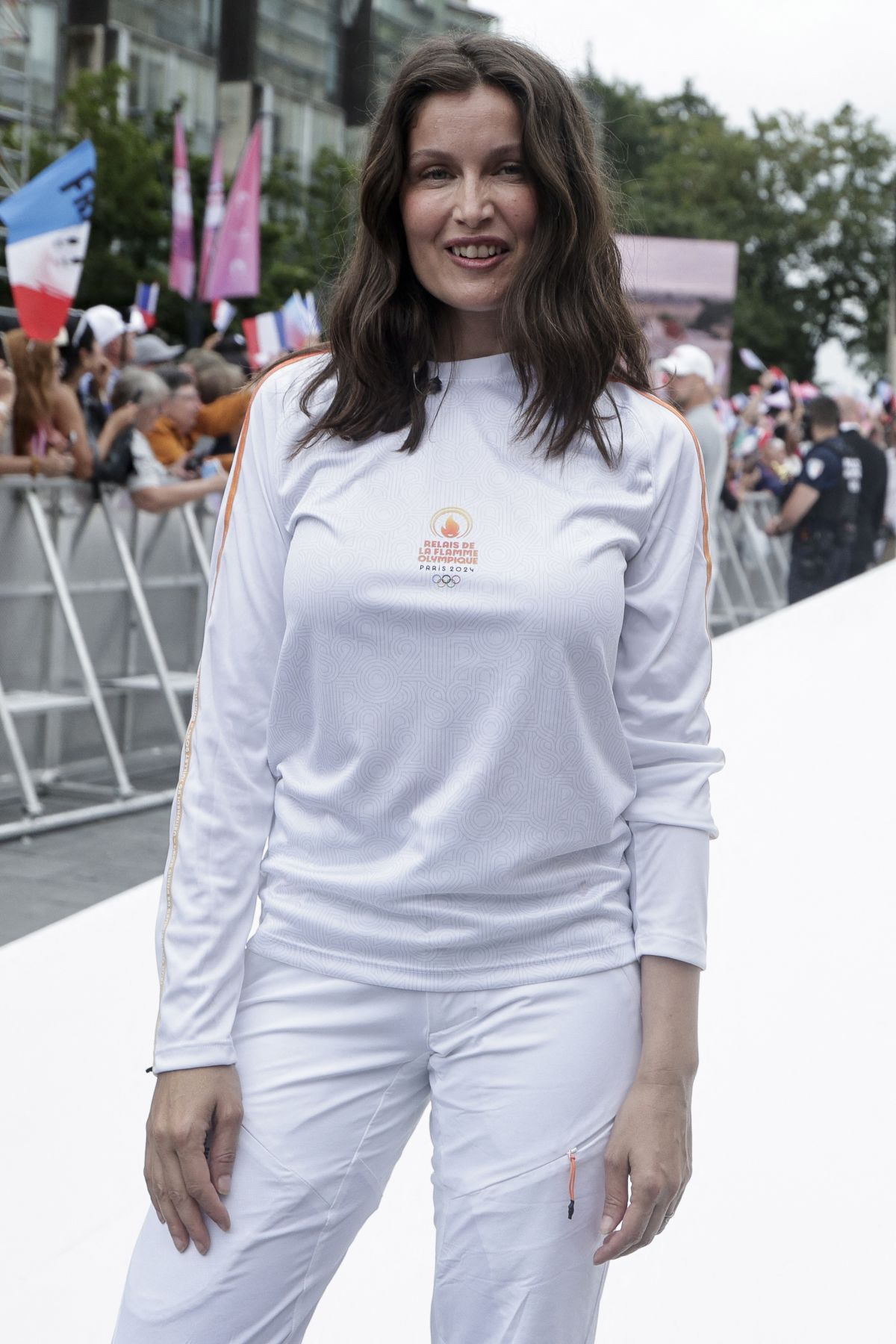 Laetitia Casta at 2024 Paris Olympic Games Torch Relayat Saint-Denis