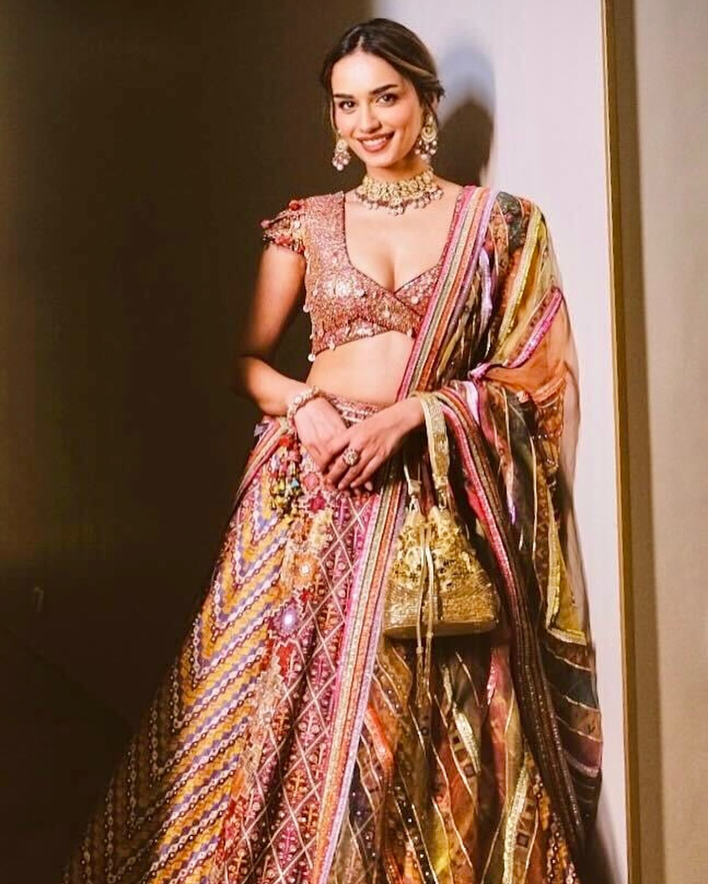 Manushi Chhillar wears Tarun Tahiliani Gota mirror work and sequin embroidered lehenga, July 2024