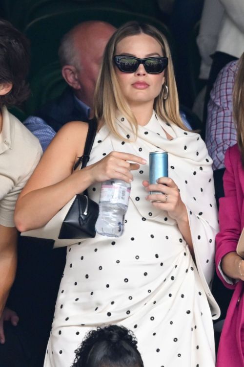 Margot Robbie wears a Dotted Dress at 2024 Wimbledon 2024 in London