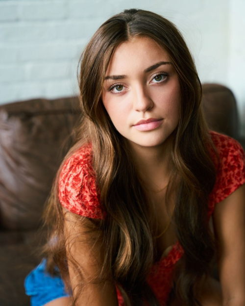 Presley Elise in a Red Top and Denim Short at a Photoshoot, August 2024 1