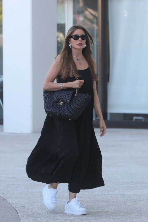 Sofia Vergara in a Black Dress and White Sports Shoes at a Nail Salon in Beverly Hills, August 2024