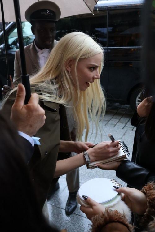 Anya Taylor Joy Taking Selfies with Fans at Paris Fashion Week 3