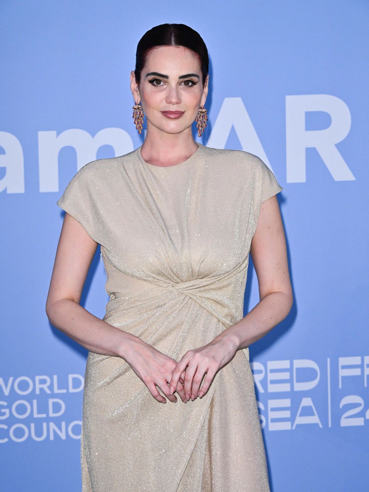 Cat Poulani at AmfAR Gala at 81st Venice Film Festival