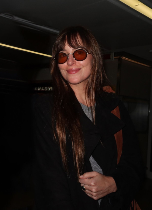 Dakota Johnson Arrives for Milan Fashion Week