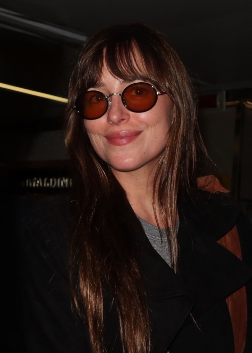 Dakota Johnson Arrives for Milan Fashion Week 1