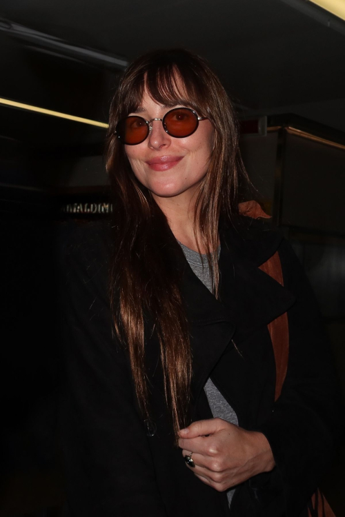 Dakota Johnson Arrives for Milan Fashion Week 2