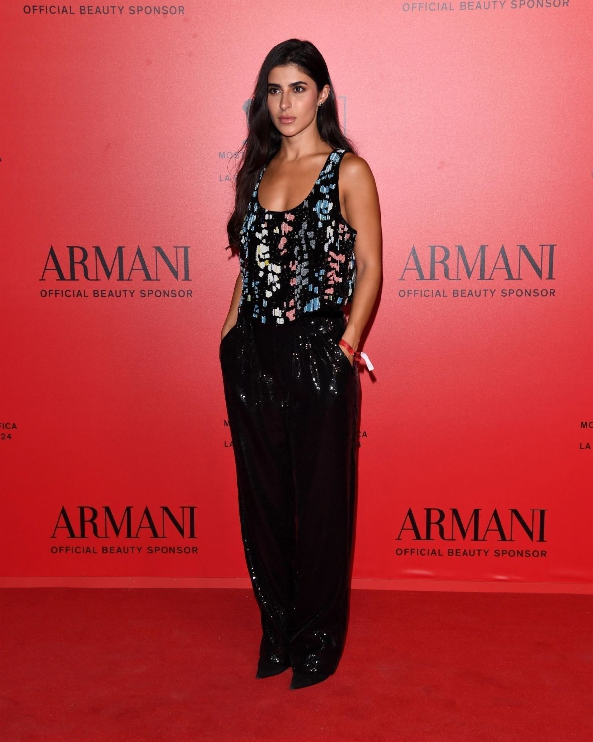 Dima Sheikhly at armani beauty dinner photocall at 81st venice international film festival