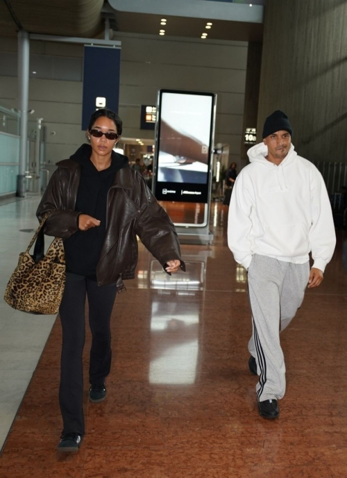 Laura Harrier and Sam Jarou Touch Down at Paris CDG Airport 5