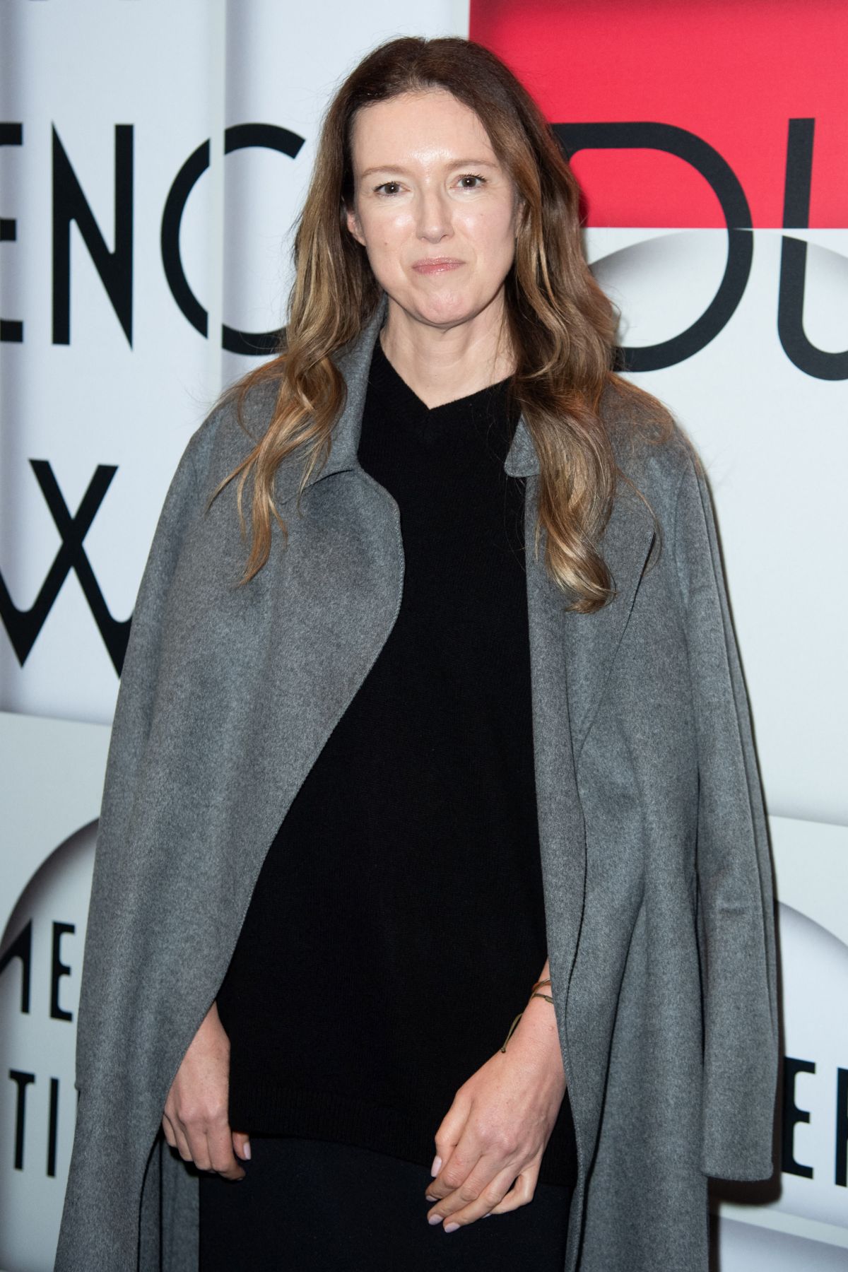 Clare Waight Keller at Uniqlo Lifewear Exhibition Cocktail in Paris, September 2024