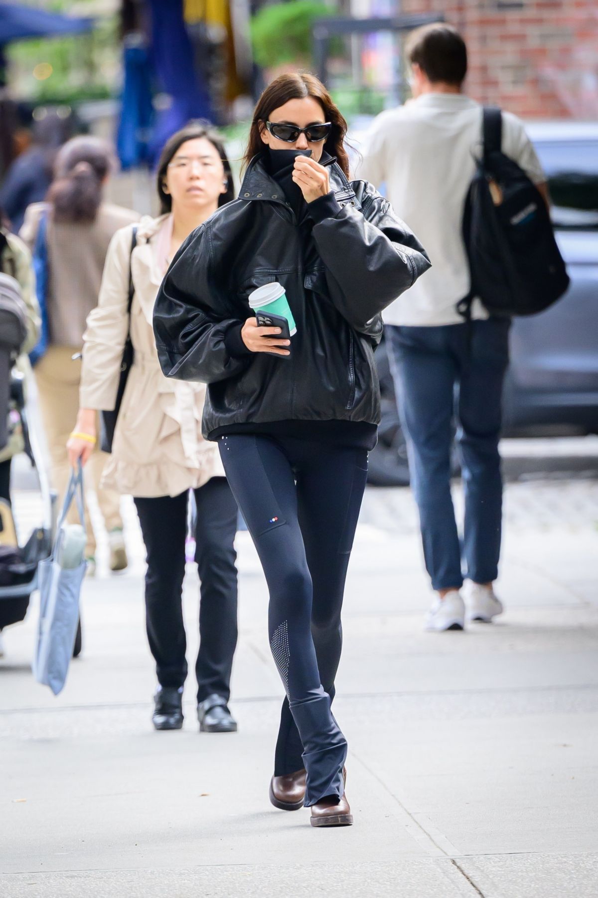 Irina Shayk in Oversized Leather Jacket Out in New York, October 2024