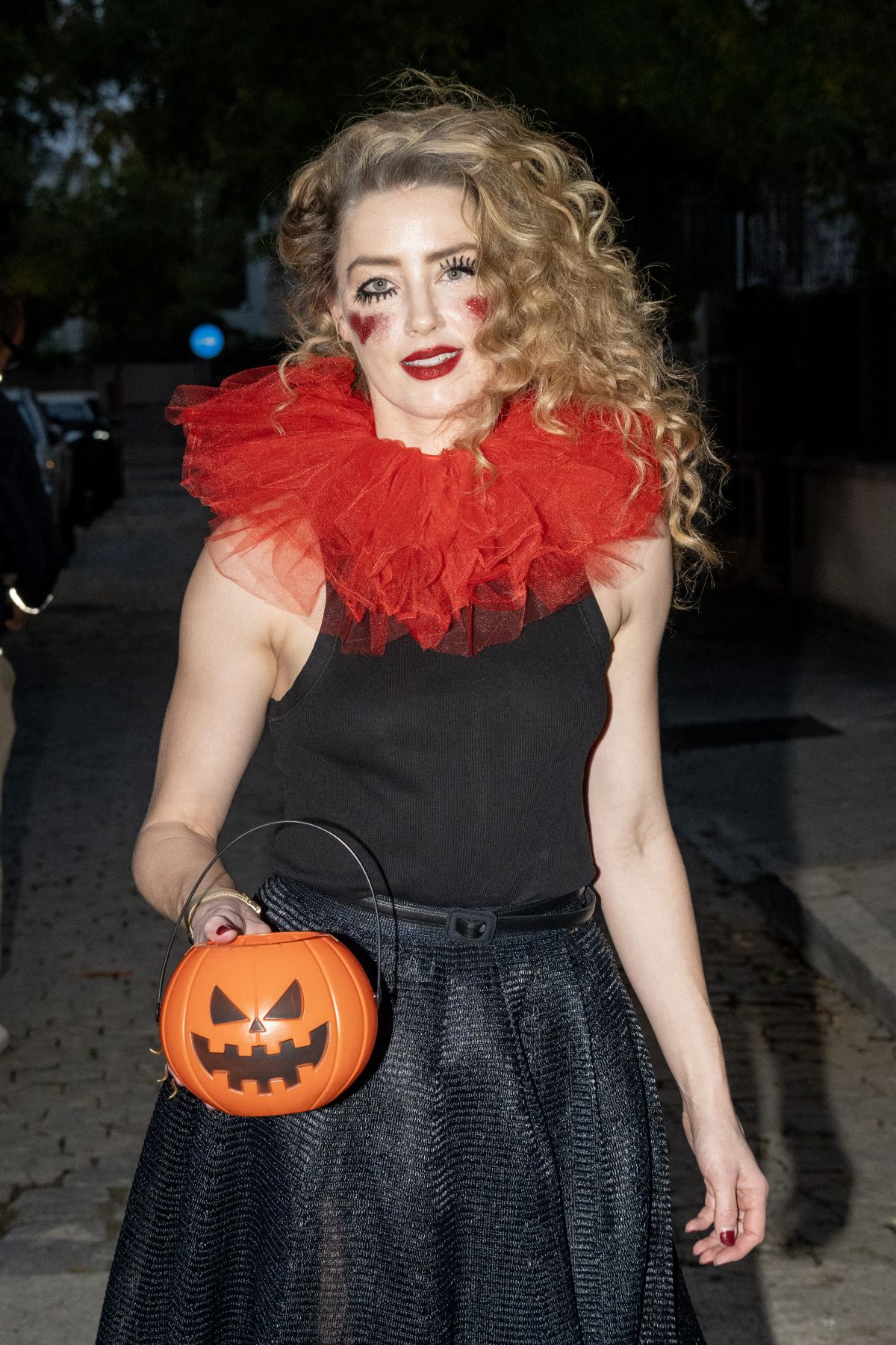 Amber Heard in Quirky Clown Makeup and Red Ruff Collar Celebrates Halloween, October 2024