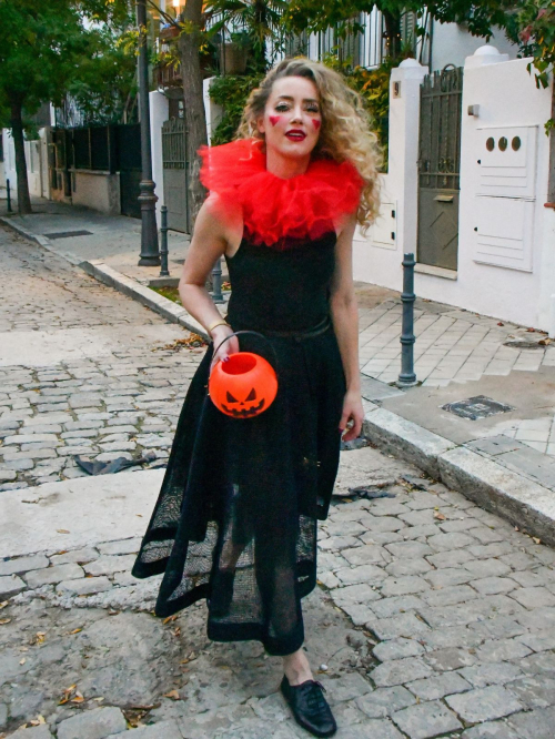 Amber Heard in Quirky Clown Makeup and Red Ruff Collar Celebrates Halloween, October 2024 2