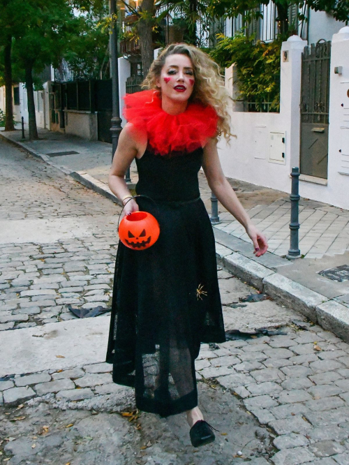 Amber Heard in Quirky Clown Makeup and Red Ruff Collar Celebrates Halloween, October 2024 4