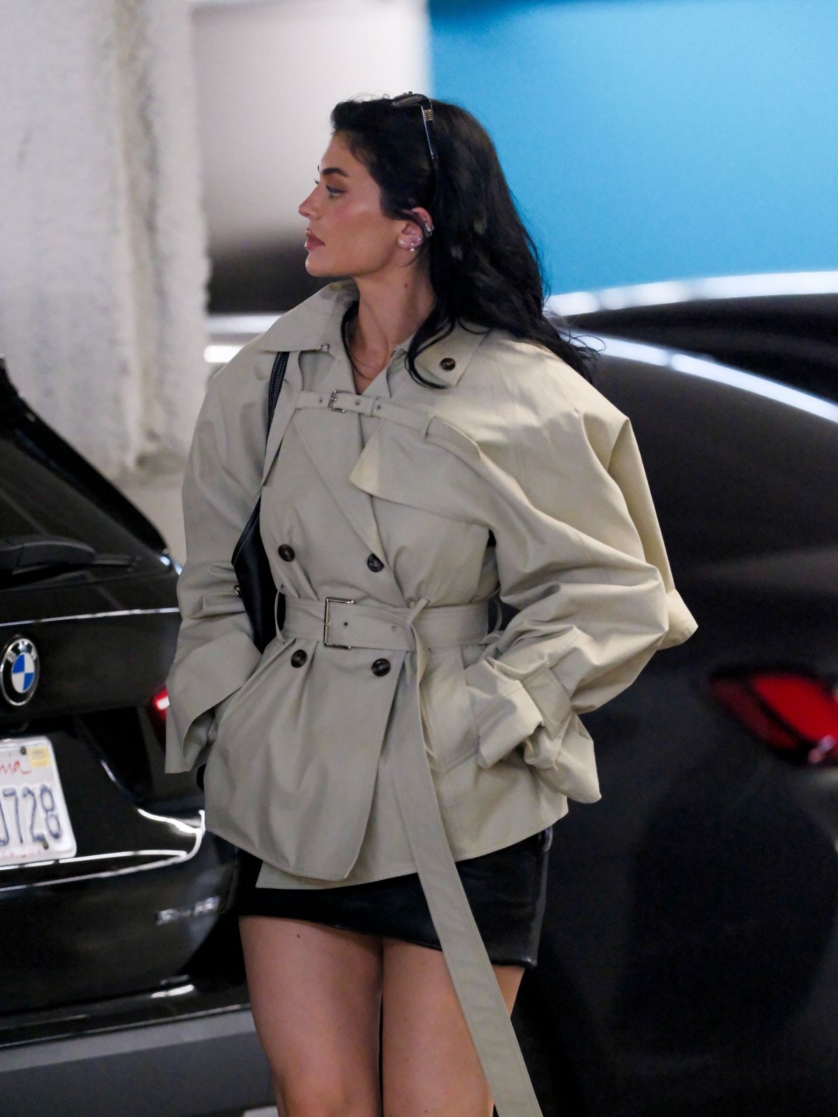 Kylie Jenner in Reading Glasses and Leather Mini-skirt, November 2024