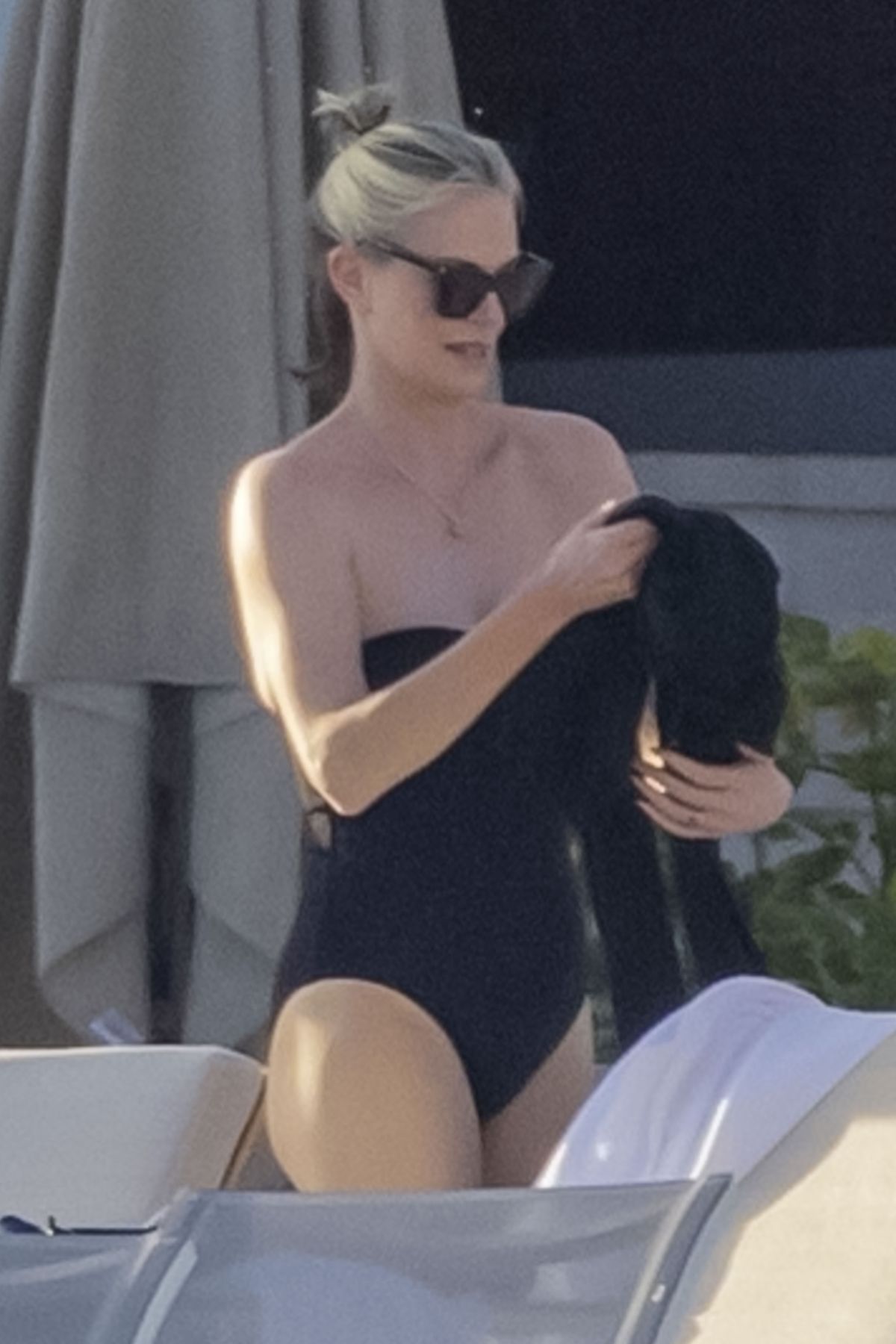 Charlize Theron in Beach Swimsuit in Mexico, December 2024