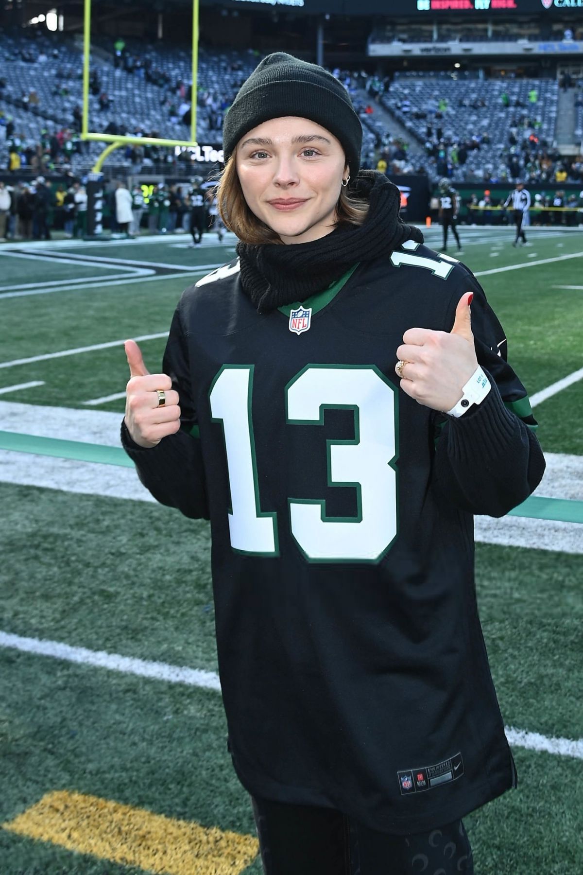 Chloe Moretz at NFL Game Between Jets and Seahawks, December 2024