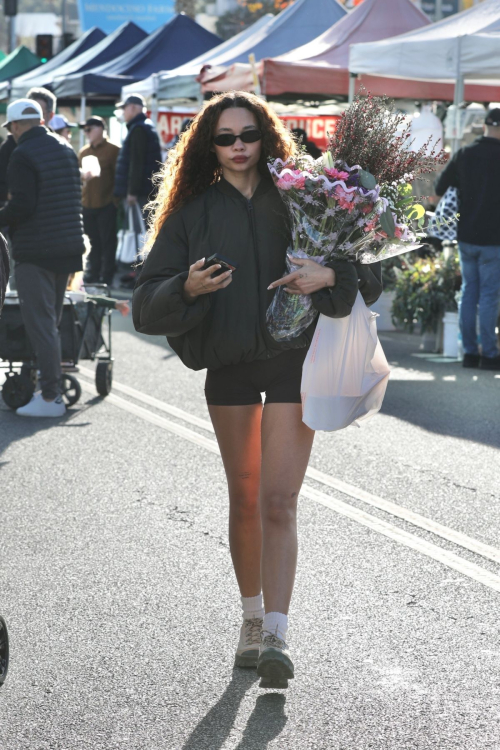 Ashley Moore Picks Up Flowers at Farmers Market, January 2025 1