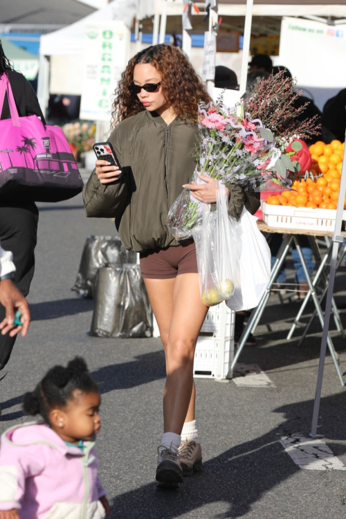 Ashley Moore Picks Up Flowers at Farmers Market, January 2025 2