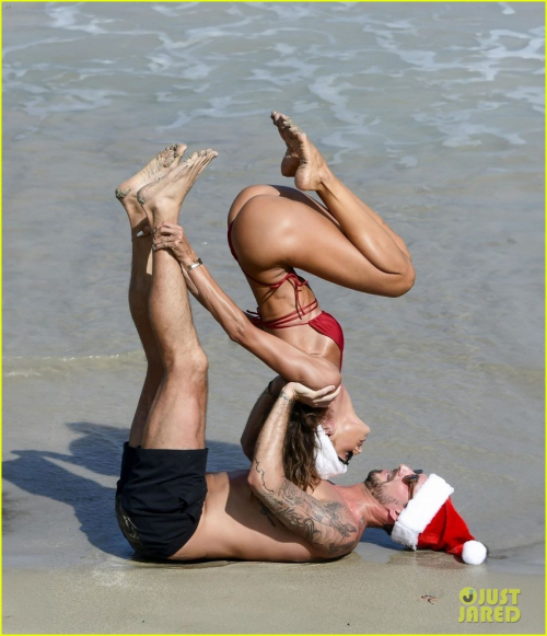 Izabel Goulart Practices Yoga on Beach in St. Barts, December 2024 13