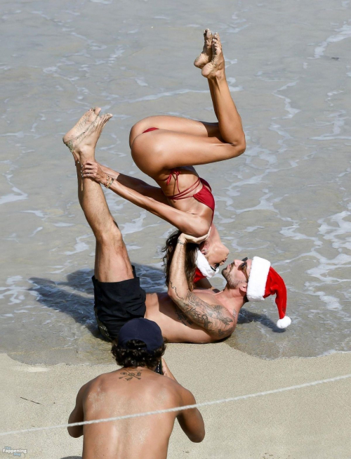 Izabel Goulart Practices Yoga on Beach in St. Barts, December 2024 14