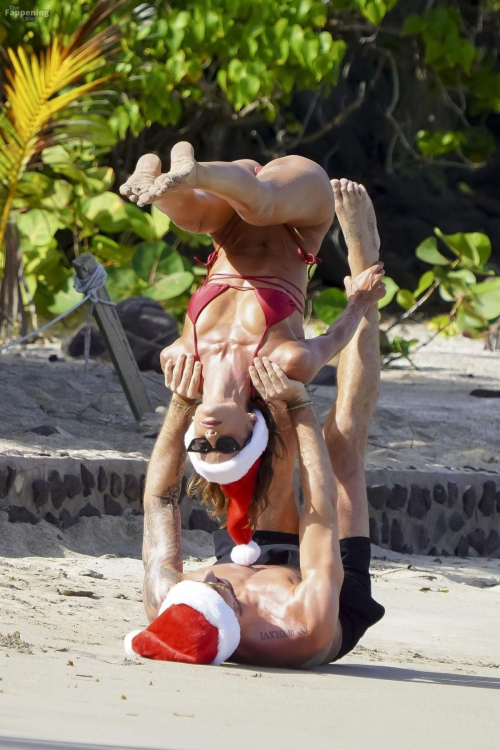 Izabel Goulart Practices Yoga on Beach in St. Barts, December 2024 3